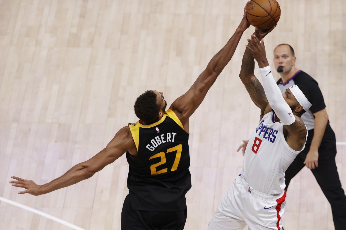 Rudy Gobert (27) blocks Marcus Morris (8) to seal the win for the Utah Jazz